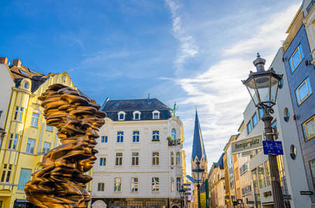 Bonn, Germany, August 23, 2019: buildings in historical city centre with view of Bonn Minster or Bonner Munster Roman Catholic church spire, North Rhine-Westphalia regionのeditorial素材
