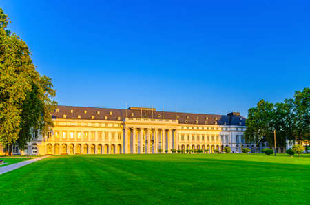 Koblenz, Germany, August 23, 2019: Electoral Palace Schloss building and Schlossvorplatz green grass lawn square in Koblenz historical city centre, blue sky background, Rhineland-Palatinate stateのeditorial素材