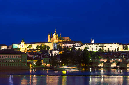Watercolor drawing of View of Prague old town, historical center with Prague Castle, St. Vitus Cathedral, Charles Bridge Karluv Most, Vltava river, night twilight evening, Bohemia, Czech Republicの写真素材