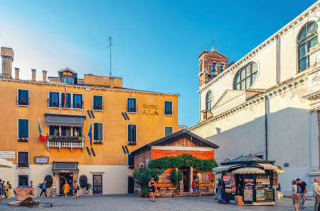 Venice, Italy, September 13, 2019: Campo Santa Maria Zobenigo square with Chiesa di Santa Maria del Giglio catholic church and souvenir kiosk in historical city center San Marco sestiereのeditorial素材