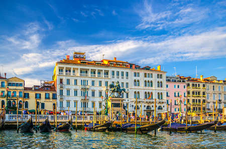 Venice, Italy, September 14, 2019: Monumento a Vittorio Emanuele II monument, Hotel Londra Palace building and Riva degli Schiavoni waterfront embankment with moored gondolasのeditorial素材
