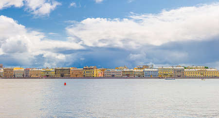 Panorama of Saint Petersburg Leningrad city with row of old colorful buildings on embankment riverfront of Neva river in historical city center, Russia, Panoramic view of Saint Petersburg cityscapeの写真素材