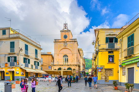 Tropea, Italy - May 8, 2018: typical italian narrow street of Tropea town historical center with old buildings, people tourists walking down in centro storico, Vibo Valentia, Calabria, Southern Italyのeditorial素材