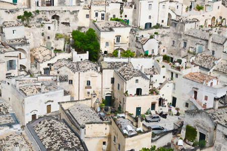Watercolor drawing of Matera white stone houses of historical centre Sasso Barisano of old ancient...