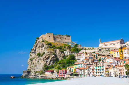 Watercolor drawing of seaside town village Scilla with old medieval castle on rock Castello Ruffo, colorful traditional typical italian houses on Mediterranean Tyrrhenian sea coast, Calabria, Italyの写真素材