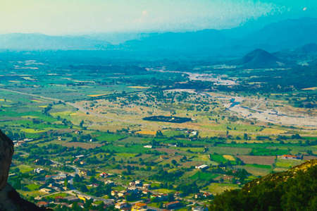 Watercolor drawing of View of mountains and valley near town of Kalabaka from the top of rock Holy Trinity Monastery of Meteora Monasteries, Greeceの写真素材
