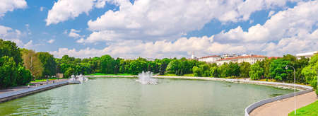 Watercolor drawing of Panorama of Minsk cityscape with Svislach Svislac river embankment, Janka Kupala Park and General Headquarters building in historical centre, blue sky, Republic of Belarusの写真素材