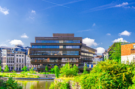 De Krook library building postmodern Architectural style on quay Nelson Mandela promenade of river Scheldt in Ghent city historical center, East Flanders province, Flemish Region, Belgiumの写真素材