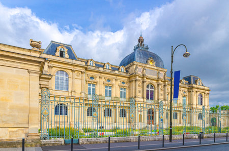 The Picardy Museum Musee de Picardie Second Empire style eclectic architecture style building in Amiens old historical city centre, blue sky background, Somme department, Hauts-de-France Regionの写真素材
