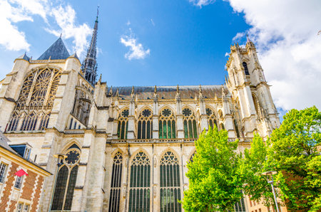 Amiens Cathedral Basilica of Our Lady Roman Catholic Church High Gothic architecture style building in old historical city centre, Cathedrale Notre-Dame, Hauts-de-France Region, Northern Franceの写真素材