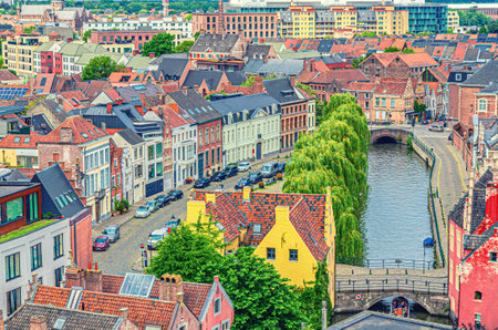 Ghent cityscape with aerial view of Prinsenhof Princes Court quarter district in Ghent historic city center with old colorful buildings and Lieve water canal in Gent old town, Flemish region, Belgiumの写真素材