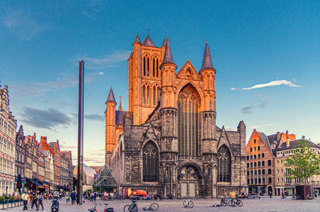 Korenmarkt Wheat Market square with Saint Nicholas Church Scheldt Gothic style building and row colorful buildings in Ghent city historical center, East Flanders province, Flemish Region, Belgiumの写真素材