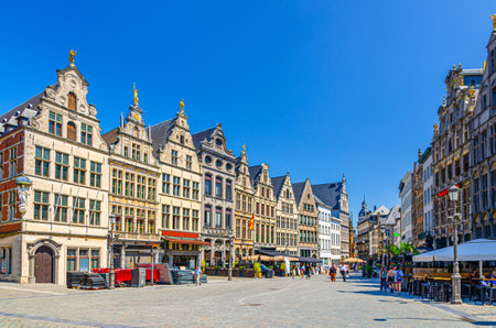 Antwerpen old town with typical flemish style houses buildings with gables and street restaurants on Big Market Square pedestrian street in Antwerp city historical centre, Flemish Region, Belgiumの写真素材
