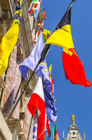 European countries flags on facade of Antwerp City Hall Stadhuis Antwerpen building in Antwerp city historical centre, vertical view, Flemish Region, Belgiumの写真素材