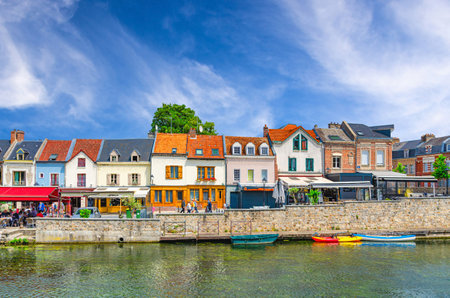 Amiens old town Saint-Leu quarter, embankment promenade Quai Belu of Somme river water canal with street restaurants, typical houses in historical city centre, France landmarks, Somme departmentの写真素材