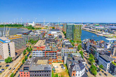 Antwerp cityscape, aerial panoramic view of Antwerp city Eilandje quarter neighborhood with port area, water canals on skyline horizon, panorama of Antwerp, Flemish Region, Belgiumの写真素材