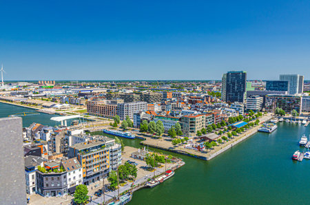 Antwerp cityscape, aerial panoramic view of Antwerp city Eilandje quarter neighborhood with port area, water canals, Bonaparte Dock, skyline horizon panorama of Antwerp, Flemish Region, Belgiumの写真素材