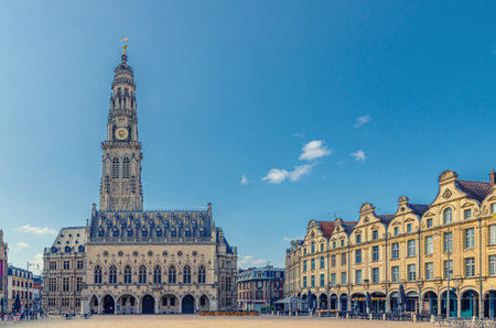 Arras Hotel de Ville town hall and Flemish-Baroque-style townhouses buildings on La Petite Place des Heros Heroes Square in Arras historical town center, blue sky in summer day, Artois, Franceの写真素材
