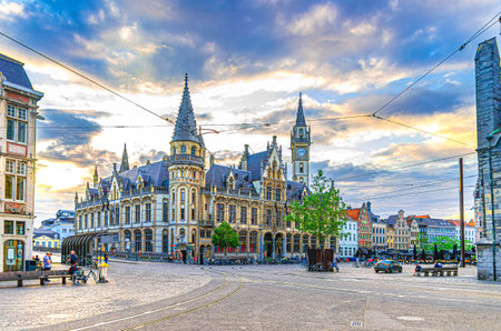 Ghent city historical center, Old Post Office building with clock tower on Korenmarkt Wheat Market square, Cityscape of Gent old town, East Flanders province, Flemish Region, Belgiumの写真素材