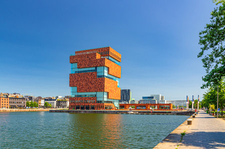 MAS Museum aan de Stroom Museum by the Stream, modern warehouse spiral tower building, embankment of Bonaparte Dock in Antwerp city historical centre, Antwerpen port area, Flemish Region, Belgiumの写真素材