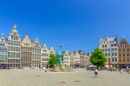 Antwerp cityscape with Brabofontein Brabo Fountain and guild houses guildhalls buildings on Grote Markt Big Market Square in historical city centre, Antwerpen old town, Flemish Region, Belgiumの写真素材
