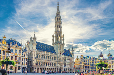 The Grand-Place Grote Markt Big Market square in Brussels city historical center with crowd people tourists, Town Hall Brabantine Gothic style and Baroque guildhalls Guilds of Brussels, Belgiumの写真素材