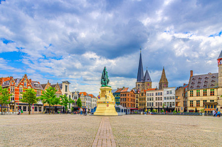 Vrijdagmarkt Friday market square with Jacob van Artevelde statue and old colorful flemish buildings in Ghent historical city centre, Gent old town, East Flanders province, Flemish Region, Belgiumの写真素材