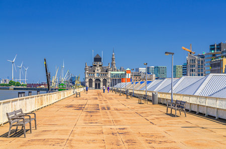Embankment promenade of Scheldt river on Cruise ponton and Maritiem Park Afdaken, port area in Antwerp city historical centre, Antwerpen old town, Flemish Region, Belgiumの写真素材