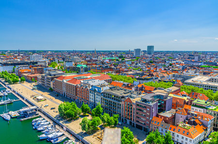 Antwerp cityscape, aerial panoramic view of Antwerp city, embankment promenade of Bonaparte Dock, quay harbor with yachts motor boats, skyline panorama of Antwerp old town, Flemish Region, Belgiumの写真素材