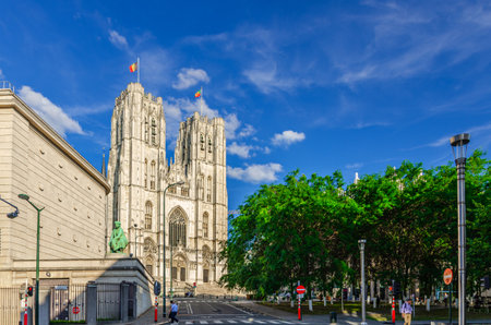 The Cathedral of St. Michael and St. Gudula medieval Roman Catholic cathedral Brabantine Gothic architecture style building with bell towers in Brussels city historical center, vertical view, Belgiumの写真素材