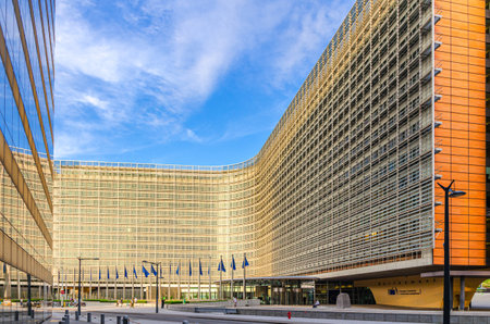 Berlaymont building the headquarters of the European Commission and EU flags in European Quarter of Brussels city, Brussels-Capital Region, Belgiumの写真素材