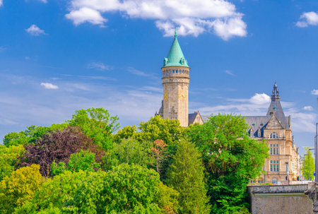 Luxembourg City historical center with Tower of State Bank and Savings Bank PÃ©trusse Parks green trees on Fort Bourbon square in Bourbon Plateauの写真素材