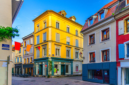 Old town Mulhouse city historic center with narrow pedestrian street, old colorful buildings, typical multicolored houses, Alsace Grand Est region, Franceの写真素材