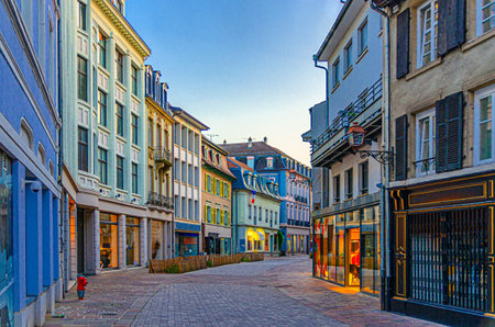 Old town Mulhouse city historic center with narrow pedestrian street, old colorful buildings, typical multicolored houses, Alsace Grand Est region, Franceの写真素材