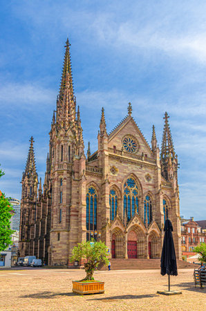 Temple Saint-Etienne Calvinist church Cathedral of Mulhouse building on Place de la Reunion square in old town Mulhouse city historic centre, Alsace Grand Est region, Franceの写真素材