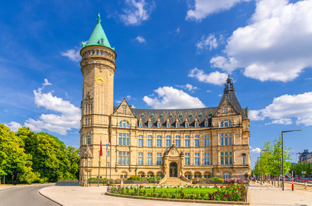State Bank and Savings Bank Spuerkeess building with clock tower Banque et Caisse d'Epargne de l'Etaton Fort Bourbon square in Bourbon Plateau district in Luxembourg City historical centerの写真素材