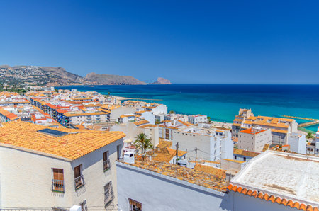 Altea old town aerial view with typical white houses buildings red tiled roofs, Altea bay...