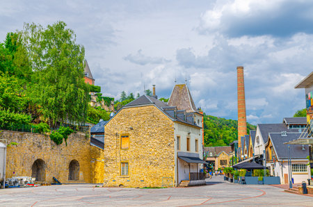 Les Rives de Clausen restaurant and bar district in Grund quarter of Luxembourg City historical center with old buildings and brick chimneyの写真素材