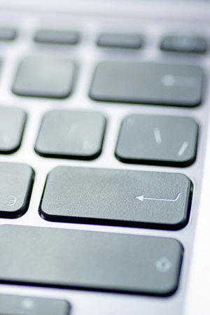 Laptop Keyboard Keys Close-Up Backgroundの写真素材