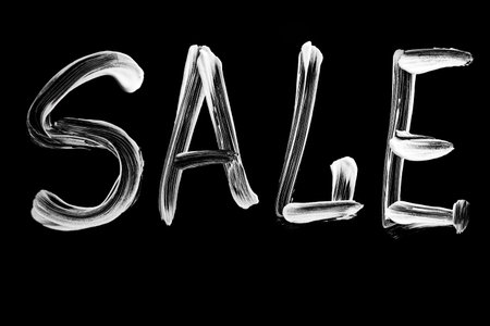 Professional handwritten SALE sign with rough texture. High contrast lettering for ecommerce,...