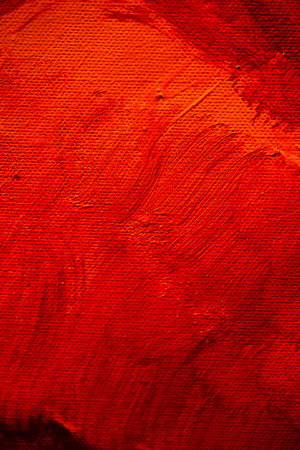 Dramatic red background with wavy textures and deep shadows reminiscent of fire or hot liquid for...