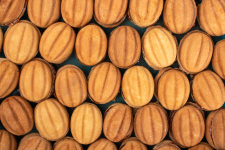 Cookies nut with condensed milk background. Food concept