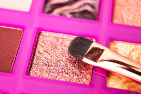 Eye shadow palette on a light background. Photography for advertising design, cover, banner