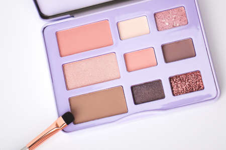 Eye shadow palette on a light background. Photography for advertising design, cover, bannerの写真素材