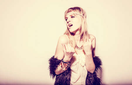 	Beautiful young woman hippie on white backgroundの写真素材