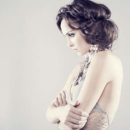 Young brunette lady with luxury accessories の写真素材