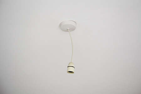 Empty lamp holder on white backgroundの写真素材