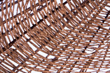 Straw umbrella closeup texture in the daylightの写真素材