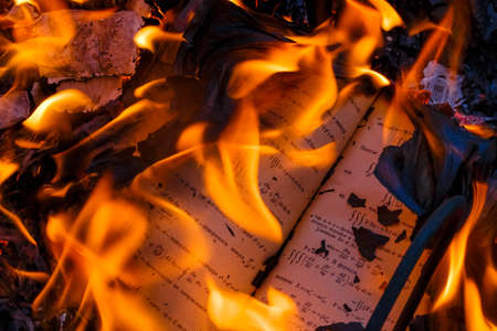 Burning a book, a textbook on higher mathematicsの写真素材