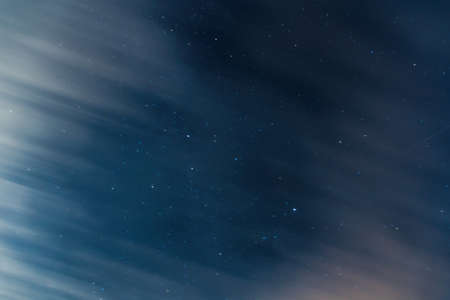 Night sky magic cloud. Infinity Blue Background and Shining Stars. Long time cadreの写真素材